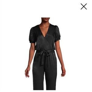 NWT Black jumpsuit with crossover front, pockets and belt